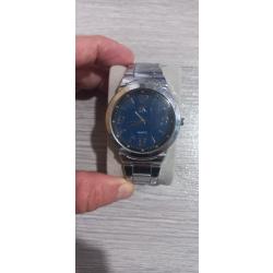 Vend montre iK quartz homme