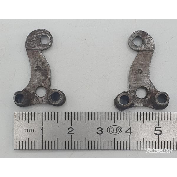 Brides de noix pour fusil ancien.