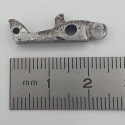 G&acirc;chette pour arme inconnue.