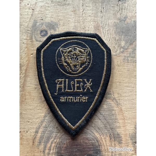 Insigne ancienne Alex armurier