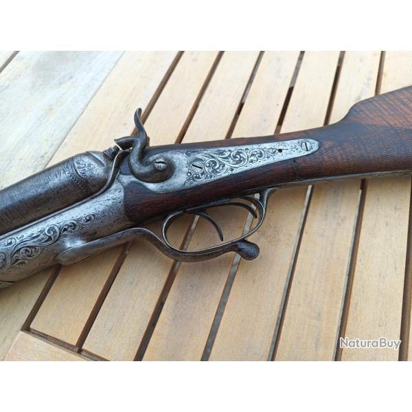 Fusil Juxtapos� calibre 12/65 � chiens ext�rieurs canon Damas