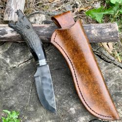 couteau d'artisan d'exception / le loup noir , lame brute de forge en acier carbone 1075