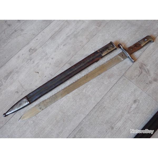 70334 Baionnette de pionnier Suisse pour K11 ou K31. Mod�le 1914 � 65 dents de scie. Fourreau cuir