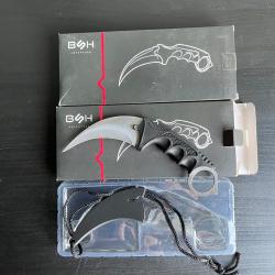 ench&egrave;re 1� pour 2 couteaux karambit