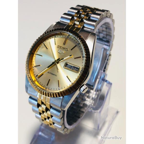 Montre Seiko 5 Automatique Bicolore Cadran Dor� Soleil Lunette Cannel�e Calibre 7009 tr�s bon �tat