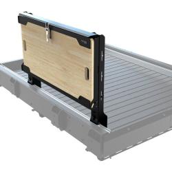 Table rabattable pour plateau coulissant de benne