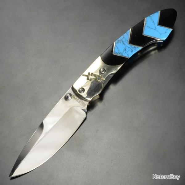 Couteau Rough Rider Turquoise Peak Lame Acier 440 Manche Imitation Turquoise Noir Linerlock RR1578