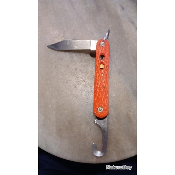 Couteau camillus mc 1 pour pi�ces ne tient pas ferm� n y  ouvert manque bouton