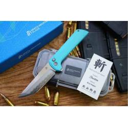 Couteau North Mountain Blade Chop 2 Lame Acier SLD-Magic San Mai Manche G10 Bleu Ciel Buttonlock