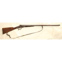 Fusil &agrave; chien calibre 12/65 &agrave; cle sous pontet , canon Damas Ronchard-Cizeron