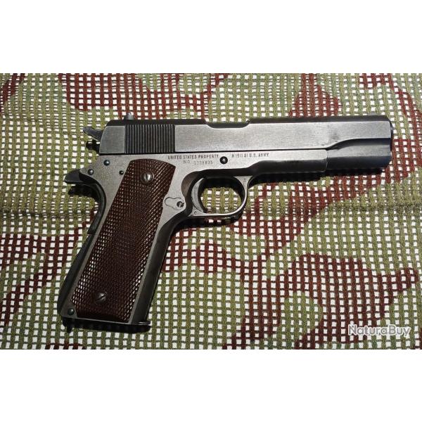 1911 remington de 1943 avec etui nominatif et canon neuf en �change standard.