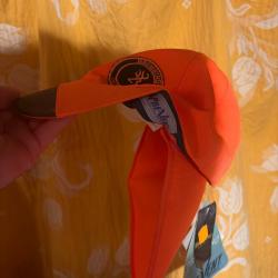 Casquette orange browing avec retomber sur le cou