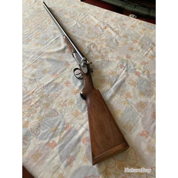 Vends fusil � chiens ext�rieurs calibre 20/70
