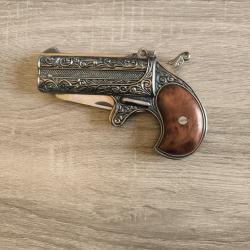 Faux Colt... Vrai couteau.