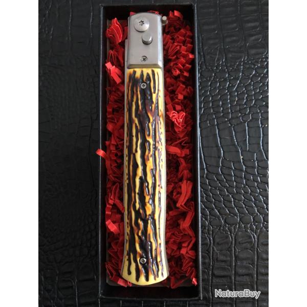 couteau � cran d'arr�t automatique