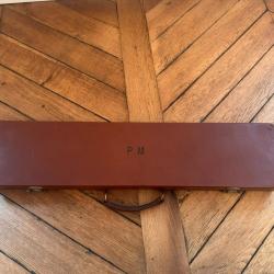 Valise de transport fusil en cuir