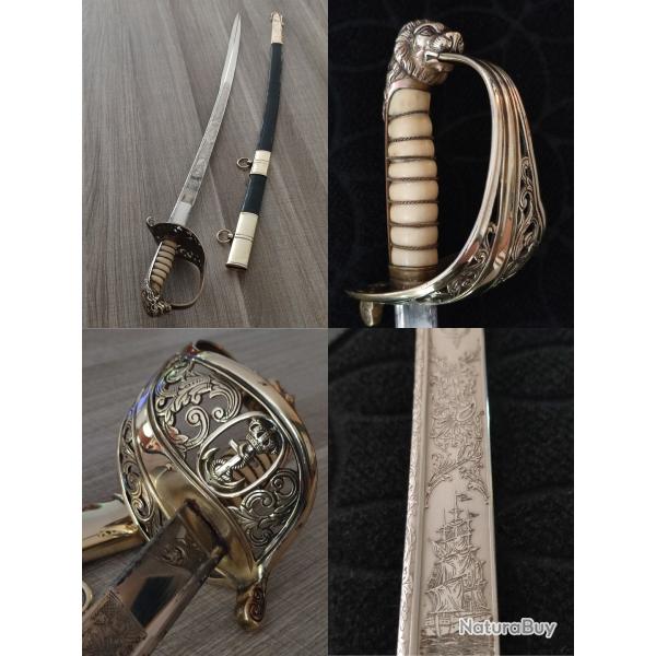 Magnifique sabre d'officier de la Marine Hollandaise lame enti�rement grav�e pommeau � t�te de Lion