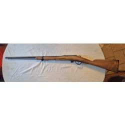 Fusil GRAS 1875 transformer chasse calibre 24. Mecanisme bon etat, mais bois pas terrible.