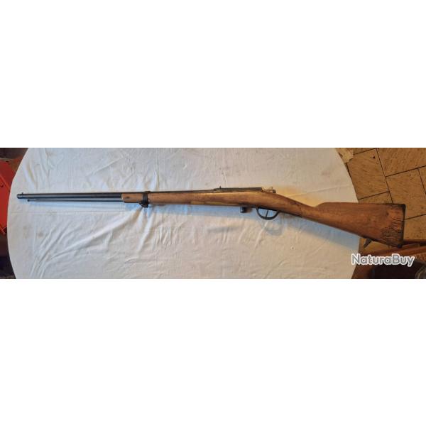 Fusil GRAS 1875 transformer chasse calibre 24. Mecanisme bon etat, mais bois pas terrible.