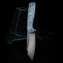 Couteau WIXCO SPLARK Lame Acier 14C28N Manche Shredded CF Blue Liner Lock WXC20A
