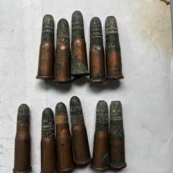 Lot  de 11 munitions 10,4 x 38 R (41 Suisse) amor&ccedil;age annulaire.