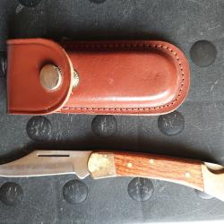 Couteau de chasse de poche pliant avec &eacute;tui cuir