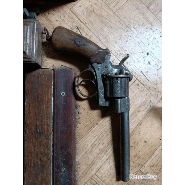 Revolver a broche grav� a restaurer