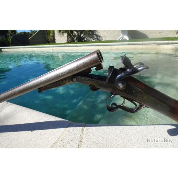 Beau fusil � broches.