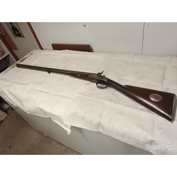 Fusil � precution calibre 10 canardi�re, bo�te � amorce en argent incurt�e dans la crosse